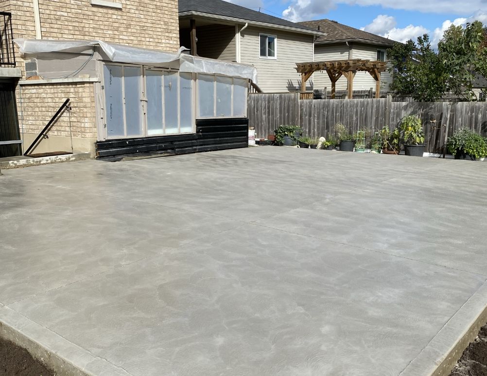 Backyard concrete and landscaping